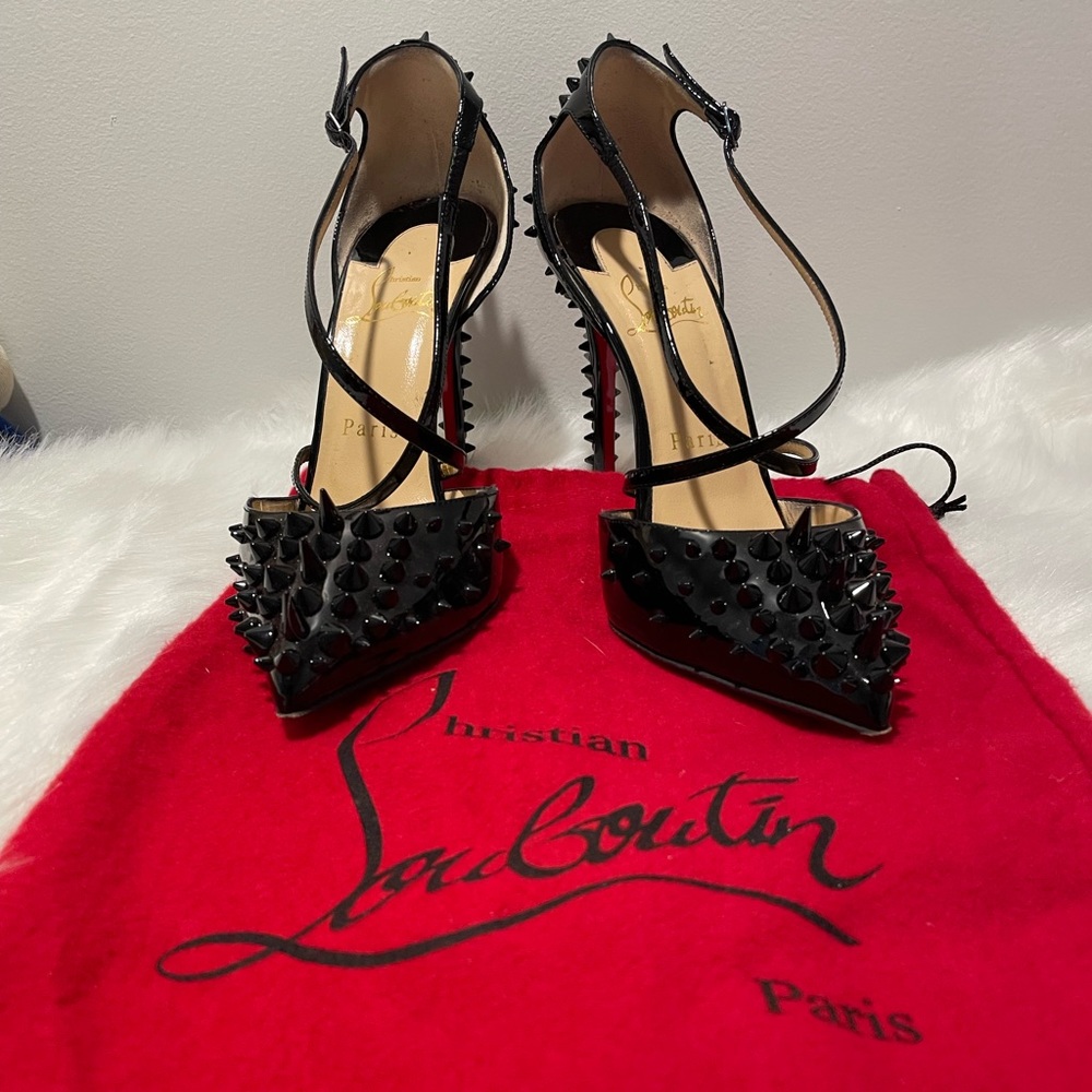 Black leather spiked Christian Louboutin heels. Size 37